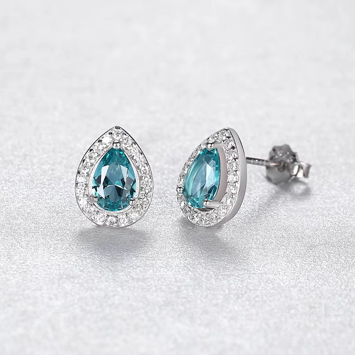 Sterling Silver Teardrop Blue Gemstone Earrings – Elegant & Sparkling
