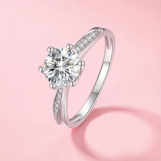 Sterling Silver Solitaire Ring with Side Stones